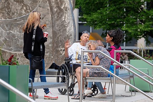 MIKE DEAL / FREE PRESS
Sandra Guiboche (in wheelchair), sits outside the Law Courts Building during a break for lunch in her trial Wednesday. Guiboche has alleged to have been dealing drugs in the Point Douglas area off and on for 25 years and was the primary target of a lengthy police investigation dubbed Project Matriarch.
240619 - Wednesday, June 19, 2024.