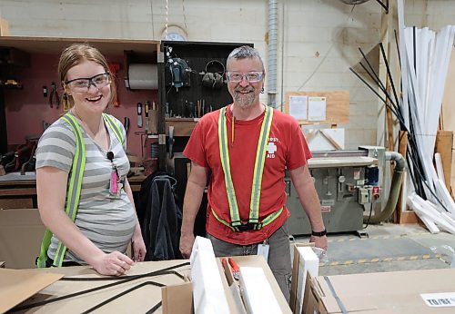 Ruth Bonneville / Free Press

BIZ - Loewen Windows

Photo of Chelsea Friesen, who's pregnant and works on packing material and her father, Vern Rempel, who has worked for the company for 34 years, and works on specialty windows, at work together Tuesday. 

For: Loewen Windows in Steinbach,  June 21 &quot;Made in Manitoba&quot; article:

Selection of photos taken at the large window manufacturing plant in Steinbach Manitoba including: wall at Loewen Windows that displays photos of employees that have worked at the company for 25+ years and photos of employees working in their large manufacturing facility.

Aaron Epp story

June 18th, 2024