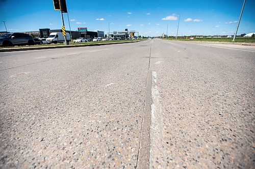 MIKAELA MACKENZIE / FREE PRESS

Faded lane painting, which is behind this year due to wet weather and a malfunctioning machine, on Kenaston at Sterling Lyon Parkway on Wednesday, June 19, 2024. 

For Malak story.

