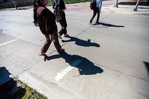 MIKAELA MACKENZIE / FREE PRESS

Faded crosswalk painting, which is behind this year due to wet weather and a malfunctioning machine, on Chancellor Drive at the SW Transitway on Wednesday, June 19, 2024. 

For Malak story.

