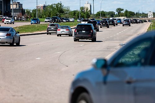 MIKAELA MACKENZIE / FREE PRESS

Faded lane painting, which is behind this year due to wet weather and a malfunctioning machine, on Kenaston at Sterling Lyon Parkway on Wednesday, June 19, 2024. 

For Malak story.

