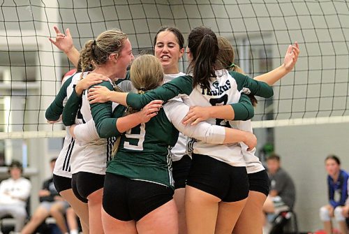 Boissevain's Danika Nell, centre, and the Winnipeg-based Vincent Massey Trojans won the 50th annual Viking Classic varsity girls volleyball tournament at the Healthy Living Centre. (Thomas Friesen/The Brandon Sun file)