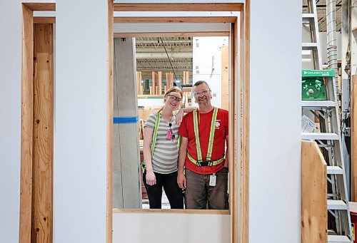 Ruth Bonneville / Free Press

BIZ - Loewen Windows

Photo of Chelsea Friesen, who's pregnant and works on packing material and her father, Vern Rempel, who has worked for the company for 34 years, and works on specialty windows, at work together Tuesday. 

For: Loewen Windows in Steinbach,  June 21 &quot;Made in Manitoba&quot; article:

Selection of photos taken at the large window manufacturing plant in Steinbach Manitoba including: wall at Loewen Windows that displays photos of employees that have worked at the company for 25+ years and photos of employees working in their large manufacturing facility.

Aaron Epp story

June 18th, 2024