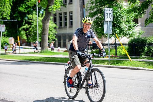 MIKAELA MACKENZIE / FREE PRESS

Cyclist Mark Gray on Wolseley Avenue, where the speed is reduced to 30km/h, on Thursday, June 20, 2024. 

For Tyler story.

