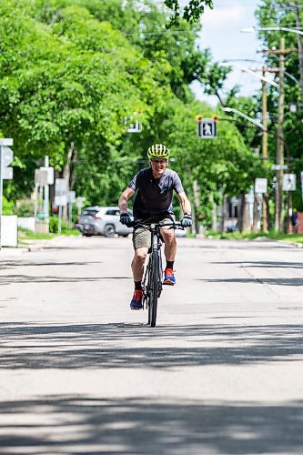 MIKAELA MACKENZIE / FREE PRESS

Cyclist Mark Gray on Wolseley Avenue, where the speed is reduced to 30km/h, on Thursday, June 20, 2024. 

For Tyler story.

