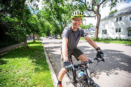 MIKAELA MACKENZIE / FREE PRESS

Cyclist Mark Gray on Wolseley Avenue, where the speed is reduced to 30km/h, on Thursday, June 20, 2024. 

For Tyler story.

