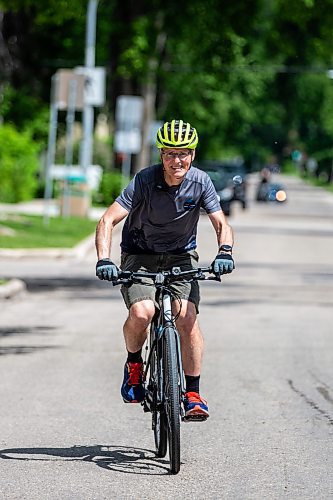 MIKAELA MACKENZIE / FREE PRESS

Cyclist Mark Gray on Wolseley Avenue, where the speed is reduced to 30km/h, on Thursday, June 20, 2024. 

For Tyler story.

