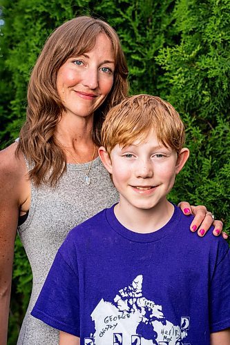 NIC ADAM / FREE PRESS
Sunshine Fund winners Jack Montgomery and his mom, Erin, pose for a photo in their backyard Thursday afternoon.
240620 - Thursday, June 20, 2024.

Reporter: Jura