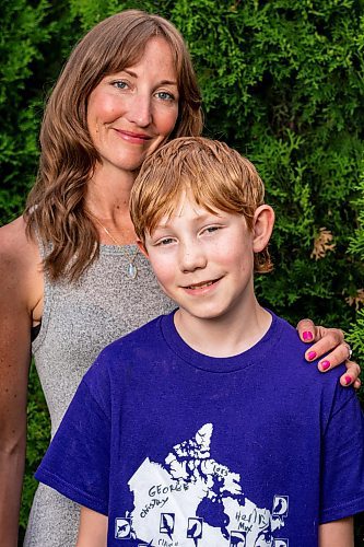 NIC ADAM / FREE PRESS
Sunshine Fund winners Jack Montgomery and his mom, Erin, pose for a photo in their backyard Thursday afternoon.
240620 - Thursday, June 20, 2024.

Reporter: Jura