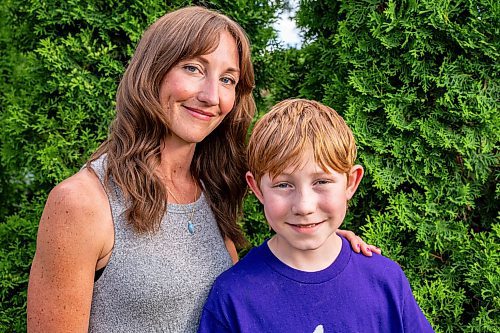 NIC ADAM / FREE PRESS
Sunshine Fund winners Jack Montgomery and his mom, Erin, pose for a photo in their backyard Thursday afternoon.
240620 - Thursday, June 20, 2024.

Reporter: Jura