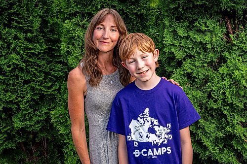 NIC ADAM / FREE PRESS
Sunshine Fund winners Jack Montgomery and his mom, Erin, pose for a photo in their backyard Thursday afternoon.
240620 - Thursday, June 20, 2024.

Reporter: Jura