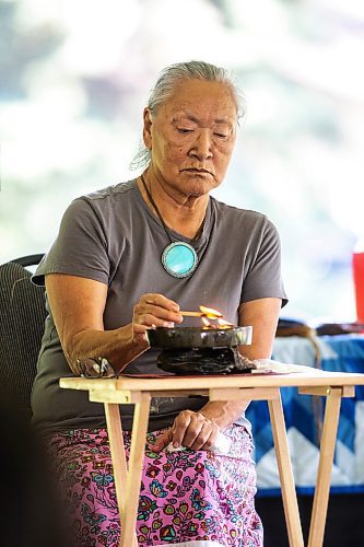 MIKAELA MACKENZIE / FREE PRESS

Elder Martha Peet tends to the qulliq at the Abinojii Mikanah renaming ceremony on Friday, June 21, 2024. 

For Joyanne story.

