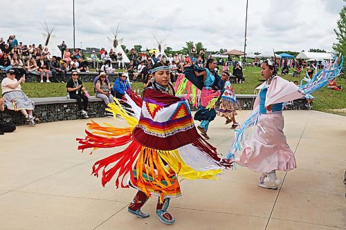 Mackenzie Courchene (foreground left) of Sioux Valley Dakota Nation and other dancers perform a fancy shawl dance as part of a powwow demonstration for visitors to National Indigenous Peoples Day 2024 celebrations at the Riverbank Discovery Centre on Friday. The celebration also included a talent show, music, bannock and other activities. See story on Page A4. (Tim Smith/The Brandon Sun)