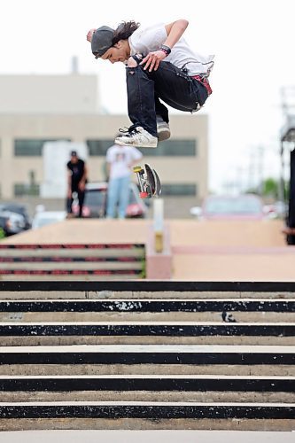 David Ledoux does a kickflip down the double-set at the Kristopher Campbell Memorial Skatepark in Brandon on Friday during Go Skateboarding Day hosted by Recovery Skateshop. The local celebration of the international Go Skateboarding Day included best trick contests, give-aways and evening entertainment at Black Wheat Brewing, and drew dozens of skateboarders to the skatepark.  (Tim Smith/The Brandon Sun)