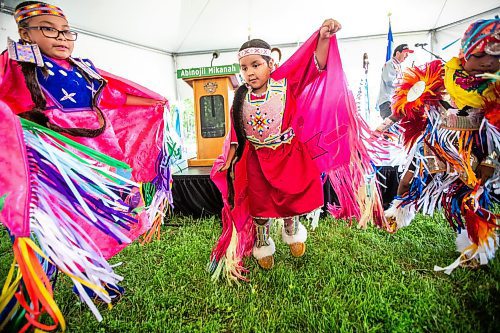 MIKAELA MACKENZIE / FREE PRESS

Callie Thompson (nine, left), Aubree Kakewash (six), and Kyrie Lawson (five) dance fancy shawl and boys fancy at the Abinojii Mikanah renaming ceremony on Friday, June 21, 2024. 

For Joyanne story.

