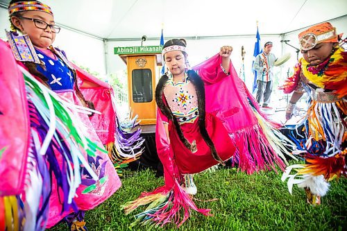 MIKAELA MACKENZIE / FREE PRESS

Callie Thompson (nine, left), Aubree Kakewash (six), and Kyrie Lawson (five) dance fancy shawl and boys fancy at the Abinojii Mikanah renaming ceremony on Friday, June 21, 2024. 

For Joyanne story.

