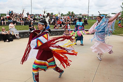 21062024
Mackenzie Courchene (foreground L) of Sioux Valley Dakota Nation and other dancers demonstrate a fancy shawl dance as part of a Powwow demonstration for visitors to National Indigenous Peoples Day 2024 celebrations at the Riverbank Discovery Centre on Friday. The celebration included powwow demonstrations, a talent show, music, bannock and other activities.  
(Tim Smith/The Brandon Sun)