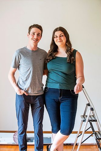 MIKAELA MACKENZIE / FREE PRESS

First-time home buyers Taylor Sumner and Evan Boychuk with their house, which they took posession of three weeks ago, on Friday, June 21, 2024. In a hot housing market with bidding wars now the norm, they managed to find this diamond in the rough and paid under asking price.

For Josh story.

