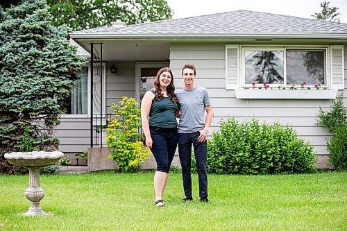 MIKAELA MACKENZIE / FREE PRESS

First-time home buyers Taylor Sumner and Evan Boychuk with their house, which they took posession of three weeks ago, on Friday, June 21, 2024. In a hot housing market with bidding wars now the norm, they managed to find this diamond in the rough and paid under asking price.

For Josh story.

