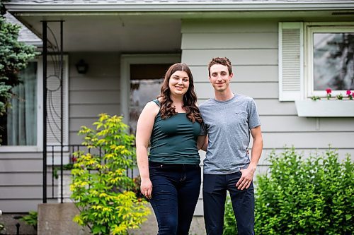 MIKAELA MACKENZIE / FREE PRESS

First-time home buyers Taylor Sumner and Evan Boychuk with their house, which they took posession of three weeks ago, on Friday, June 21, 2024. In a hot housing market with bidding wars now the norm, they managed to find this diamond in the rough and paid under asking price.

For Josh story.

