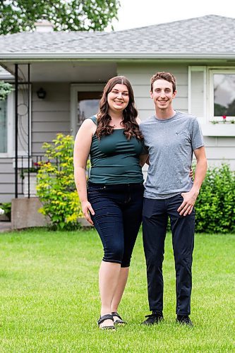 MIKAELA MACKENZIE / FREE PRESS

First-time home buyers Taylor Sumner and Evan Boychuk with their house, which they took posession of three weeks ago, on Friday, June 21, 2024. In a hot housing market with bidding wars now the norm, they managed to find this diamond in the rough and paid under asking price.

For Josh story.

