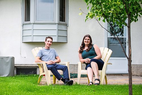 MIKAELA MACKENZIE / FREE PRESS

First-time home buyers Taylor Sumner and Evan Boychuk with their house, which they took posession of three weeks ago, on Friday, June 21, 2024. In a hot housing market with bidding wars now the norm, they managed to find this diamond in the rough and paid under asking price.

For Josh story.

