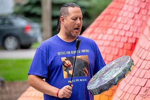 NIC ADAM / FREE PRESS
Travis Barsy, a family friend of the Contois, plays the hand drum at a memorial gathering for Rebecca Contois at Kildonan Park in conjunction with National Indigenous Peoples Day Friday evening. 
240621 - Friday, June 21, 2024.

Reporter: Erik