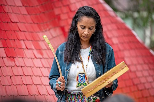 NIC ADAM / FREE PRESS
Amber Flett, a family friend of the Contois, plays a hand drum at a memorial gathering for Rebecca Contois at Kildonan Park in conjunction with National Indigenous Peoples Day Friday evening. 
240621 - Friday, June 21, 2024.

Reporter: Erik