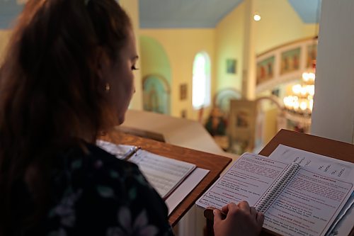 A choir member and her song book in Ukrainian during the service that celebrated the 100th anniversary of the Ukrainian Orthodox Church of the Holy Ghost on the corner of Stickney Avenue and 11th Street North in Brandon. (Michele McDougall/The Brandon Sun)   