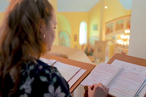 A choir member and her song book in Ukrainian are shown during a service Sunday afternoon that celebrated the 100th anniversary of the Ukrainian Orthodox Church of the Holy Ghost on the corner of Stickney Avenue and 11th Street North in Brandon. (Michele McDougall/The Brandon Sun)  