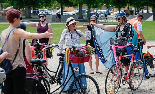 JOHN WOODS / FREE PRESS
People practice their turn signals as they take part in the second annual Fancy Women Bike Ride in Winnipeg Sunday, June 23, 2024. 

Reporter: ?