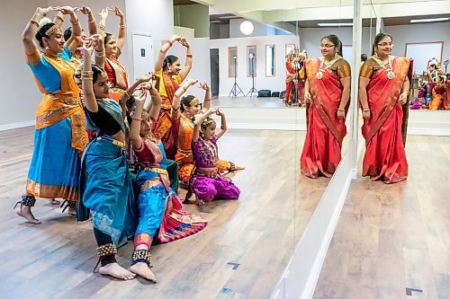 BROOK JONES / FREE PRESS
BRT Dance Academy is the only dance school in Manitoba specializing in Bharatanatyam, which is an ancient south Indian dance that originated in Tamil Nadu. Dancers were pictured at the dance academy in Winnipeg, Man., Saturday, June 15, 2024. PIctured: The mirror reflection of Bharatanatyam dances doing a general dance pose is seen as BRT Dance Academy instructor Shylaja Ramprasath (right) looks on.