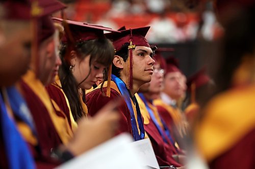 High school graduates watch their fellow grads receive their diplomas during Crocus Plains Regional Secondary School’s 2024 convocation at the Keystone Centre on Monday. See story on Page A3. (Tim Smith/The Brandon Sun)