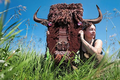 Ruth Bonneville / Free Press

ENT -  Fiber Artist

Story: 49.8 The Creators  

Portrait of Fiber Artist, Maureen Winnicki Lyons in the grassy fields at Living Prairie Museum with her life-like bison head made of  wool, yarn and leather. 

Lyons is a fiber artist who works with wool and yarn. She has collected more than 200 kinds of wool from different breeds of sheep from all over the world although, for reasons of sustainability,  she prefers working with wool from sheep which are bred in Canada. 

She is putting the finishing touches to her life-size wool and yarn bison head which will be suspended from a fence or tree at the Prairie Outdoor Exhibit in this year's Folk Festival
 
See story by AV Kitching 
Writer | Arts & Life | The Free Press

June 24th, 2024