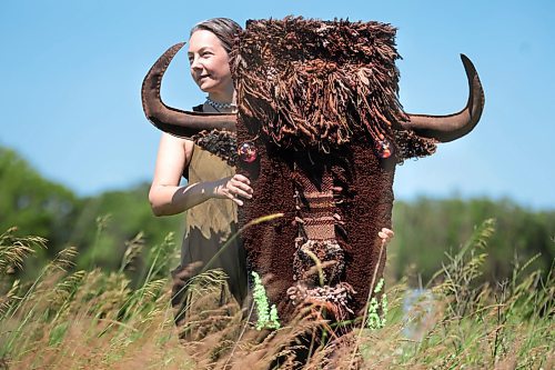 Ruth Bonneville / Free Press

ENT -  Fiber Artist

Story: 49.8 The Creators  

Portrait of Fiber Artist, Maureen Winnicki Lyons in the grassy fields at Living Prairie Museum with her life-like bison head made of  wool, yarn and leather. 

Lyons is a fiber artist who works with wool and yarn. She has collected more than 200 kinds of wool from different breeds of sheep from all over the world although, for reasons of sustainability,  she prefers working with wool from sheep which are bred in Canada. 

She is putting the finishing touches to her life-size wool and yarn bison head which will be suspended from a fence or tree at the Prairie Outdoor Exhibit in this year's Folk Festival
 
See story by AV Kitching 
Writer | Arts & Life | The Free Press

June 24th, 2024