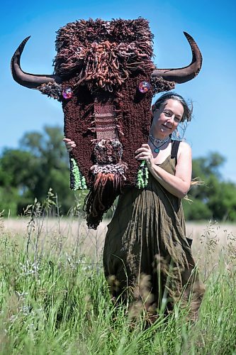 Ruth Bonneville / Free Press

ENT -  Fiber Artist

Story: 49.8 The Creators  

Portrait of Fiber Artist, Maureen Winnicki Lyons in the grassy fields at Living Prairie Museum with her life-like bison head made of  wool, yarn and leather. 

Lyons is a fiber artist who works with wool and yarn. She has collected more than 200 kinds of wool from different breeds of sheep from all over the world although, for reasons of sustainability,  she prefers working with wool from sheep which are bred in Canada. 

She is putting the finishing touches to her life-size wool and yarn bison head which will be suspended from a fence or tree at the Prairie Outdoor Exhibit in this year's Folk Festival
 
See story by AV Kitching 
Writer | Arts & Life | The Free Press

June 24th, 2024