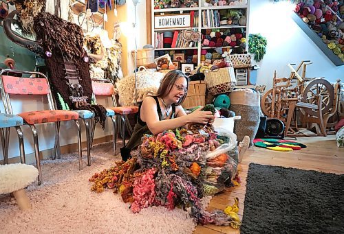 Ruth Bonneville / Free Press

ENT -  Fiber Artisit

Story: 49.8 The Creators  

Portrait of Fiber Artist, Maureen Winnicki Lyons with her colourful bag of wool from over the world in her collection at her studio.

Lyons is a fiber artist who works with wool and yarn. She has collected more than 200 kinds of wool from different breeds of sheep from all over the world although, for reasons of sustainability,  she prefers working with wool from sheep which are bred in Canada. 

She is putting the finishing touches to her life-size wool and yarn bison head which will be suspended from a fence or tree at the Prairie Outdoor Exhibit in this yearճ Folk Festival.

 
See story by AV Kitching 


June 24th, 2024