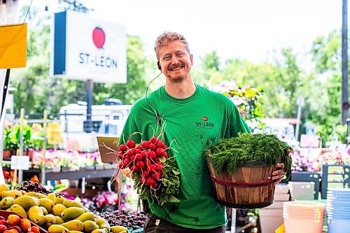 MIKAELA MACKENZIE / FREE PRESS

Colin Rémillard, co-owner of Jardins St-Léon Gardens, with local radishes and dill on Monday, June 24, 2024.

For Matt story.

