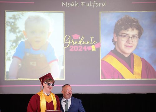 24062024
Graduate Noah Fulford wears sunglasses while posing for photos with Principal Bryce Ridgen after receiving his diploma during Crocus Plains Regional Secondary School&#x2019;s 2024 Convocation at the Keystone Centre on Monday.
(Tim Smith/The Brandon Sun)