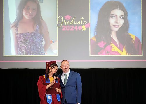 24062024
Graduate Mercedes Demas flashes a peace sign while  posing for photos with Principal Bryce Ridgen after receiving her diploma during Crocus Plains Regional Secondary School&#x2019;s 2024 Convocation at the Keystone Centre on Monday.
(Tim Smith/The Brandon Sun)