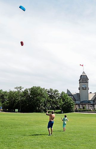 Ruth Bonneville / Free Press

Standup - Flying kites

Dad, T'ai Pu  takes advantage of the windy day to have some fun with his two sons flying kites in the field at Assiniboine Park Monday.  Their duo line, parafoil stunt kites kept them very busy as they whipped around in the wind gusts of up to 4kKM/H.  

Names:
T'ai Pu - dad
Satya Mapu -9yrs (green shirt) 
Akili Tapu 10yrs  (white shirt - not in this photo)

June 24tth, 2024