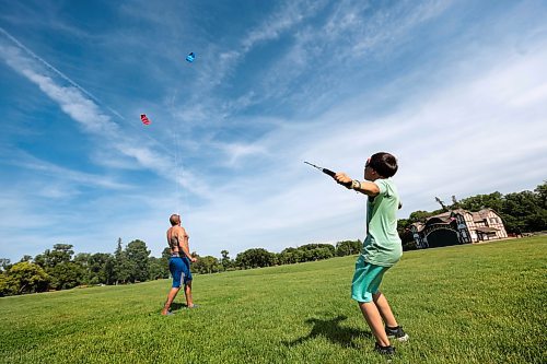 Ruth Bonneville / Free Press

Standup - Flying kites

Dad, T'ai Pu  takes advantage of the windy day to have some fun with his two sons flying kites in the field at Assiniboine Park Monday.  Their duo line, parafoil stunt kites kept them very busy as they whipped around in the wind gusts of up to 4kKM/H.  

Names:
T'ai Pu - dad
Satya Mapu -9yrs (green shirt) 
Akili Tapu 10yrs  (white shirt - not in this photo)

June 24tth, 2024