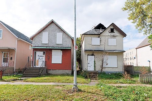 MIKE DEAL / WINNIPEG FREE PRESS
Boarded up houses at 456 and 458 Elgin Avenue.
For Winnipeggers who live next to a pair of burned-out vacant houses, the demolition of the charred shells can&#x2019;t come soon enough. They fear it&#x2019;s only a matter of time before one or both go up in flames again, after WFPS crews were called to at least four fires in a year at one of the homes. &#x201c;We don&#x2019;t have problems in the winter, it&#x2019;s when after the snow melts, it starts,&#x201d; resident Sarah Cabanting said of the fires. &#x201c;It is concerning because we are so close.&#x201d; People had been breaking into the derelict houses, located in the 400 block of Elgin and not far from the city hall. Both were boarded up Thursday. 
See Chris Kitching story
230914 - Thursday, September 14, 2023.