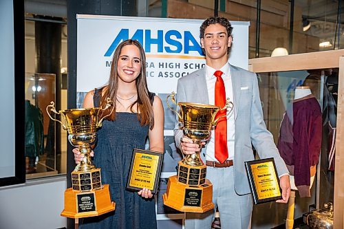 NIC ADAM / FREE PRESS
The Manitoba High Schools Athletic Association announced the winners of the 2023-2024 Athlete of the Year Awards Tuesday at the Manitoba Sports Hall of Fame.
AAAA athlete winners Danika Nell (left) and Owen Weekes pose for a photo with their awards on Tuesday.
240625 - Tuesday, June 25, 2024.

Reporter: Zoe Pierce