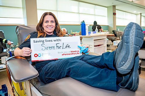 NIC ADAM / FREE PRESS
Winnipeg Fire and Paramedic Service Public Information Officer, Erin Madden, poses for a photo shortly before giving blood at this years Sirens for Life campaign at Canadian Blood Services Tuesday afternoon. 
240625 - Tuesday, June 25, 2024.

Reporter: Jura