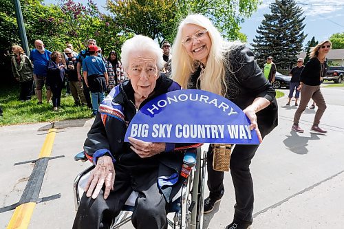 MIKE DEAL / FREE PRESS
Ray St. Germain and his wife Glory during the honorary renaming of St. Michael Road in St. Vital to Big Sky Country Way, Friday morning.
See Ben Waldman story
240607 - Friday, June 07, 2024.