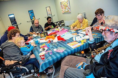 NIC ADAM / FREE PRESS
Stroke survivors in the Stroke Recovery Association of Manitoba&#x2019;s art class make tissue paper art on Wednesday morning.
(From bottom left, clockwise) Shawn Obedzinski and her grandson Tucker, Tristan Nicolas, Daniel Kimball, Pat Milchell, Vera Hrycenko, Charlotte Watkins, and Joe Unrau.
240626 - Wednesday, June 26, 2024.

Reporter: Thandi