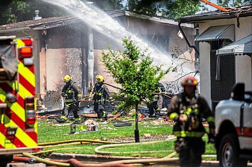 MIKAELA MACKENZIE / FREE PRESS

Fire crews at the scene of a house explosion on Camrose Bay in Transcona on Wednesday, June 26, 2024.

For Malak story.

