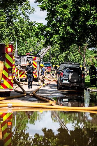 MIKAELA MACKENZIE / FREE PRESS

Fire crews at the scene of a house explosion on Camrose Bay in Transcona on Wednesday, June 26, 2024.

For Malak story.

