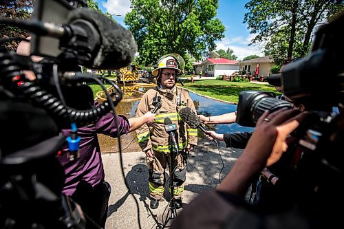 MIKAELA MACKENZIE / FREE PRESS

Deputy fire chief Scott Wilkinson speaks to the media at the scene of a house explosion on Camrose Bay in Transcona on Wednesday, June 26, 2024.

For Malak story.

